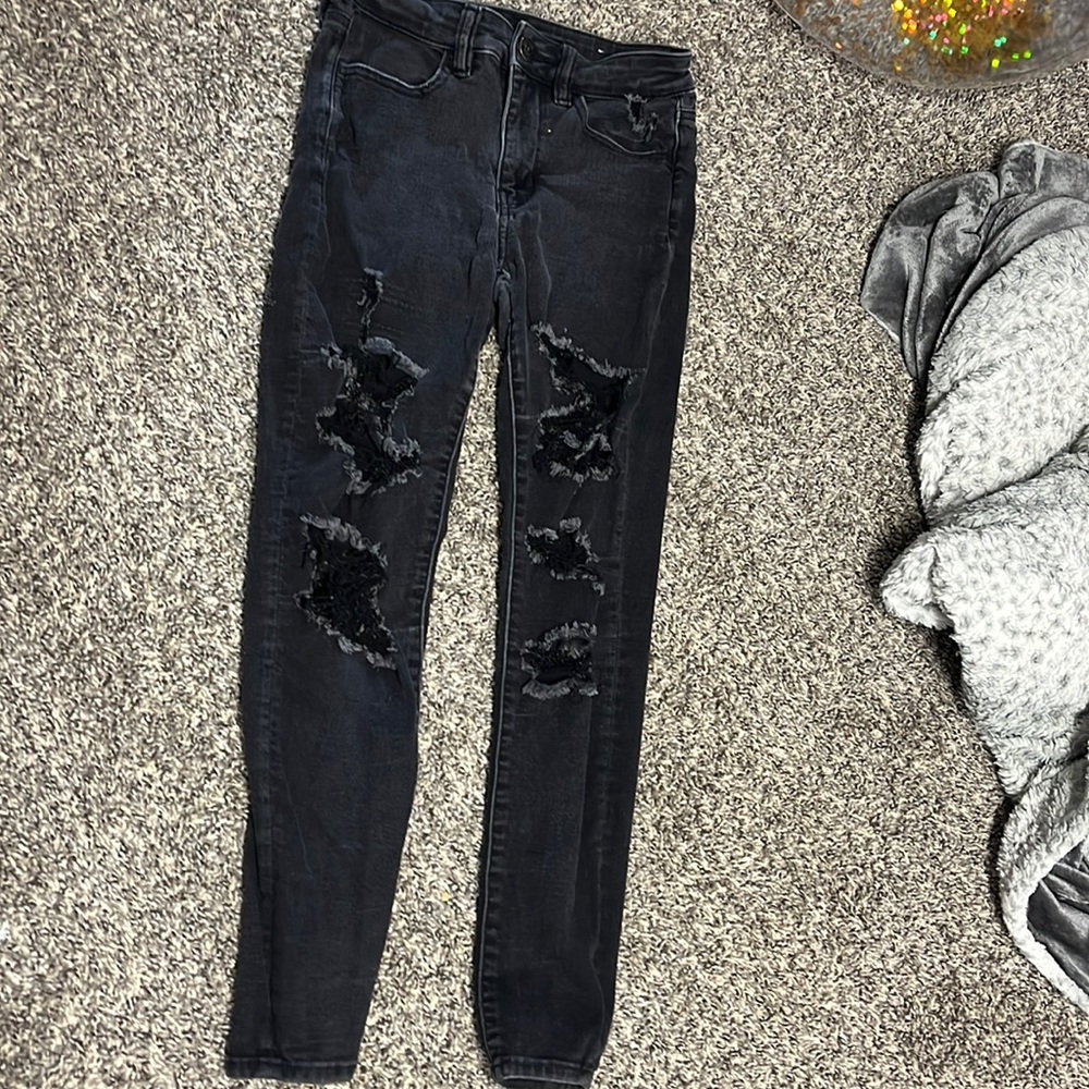black ripped jeans